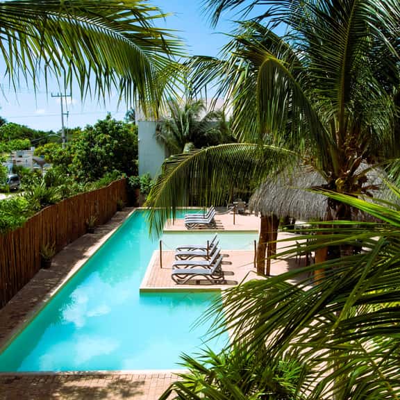 Welcome to this 1 bed 1 bath condo with splendid pool view - Image 1